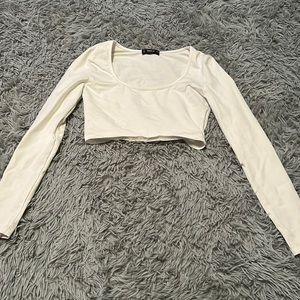 Cropped white long sleeve shirt